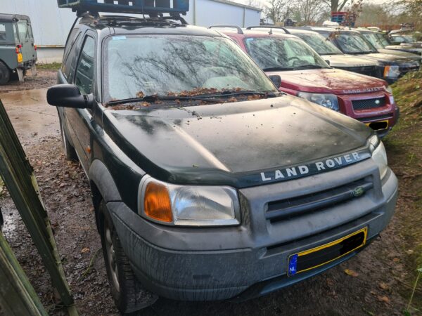 freelander 1 L314 stationwagon 1800 cc benzine , handgeschakeld kleur epson green grijskenteken met LPG met stoffen bekleding bouwjaar 2000