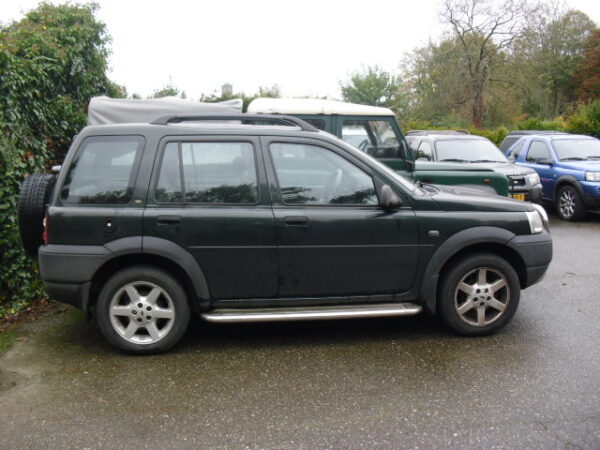 freelander 1 L314 stationwagon 1800 cc benzine , handgeschakeld kleur epson greenmet grijs leren stoelen bouwjaar 2002