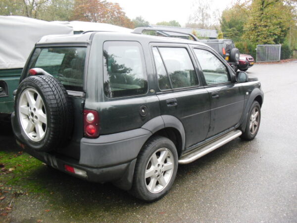 freelander 1 L314 stationwagon 1800 cc benzine , handgeschakeld kleur epson greenmet grijs leren stoelen bouwjaar 2002