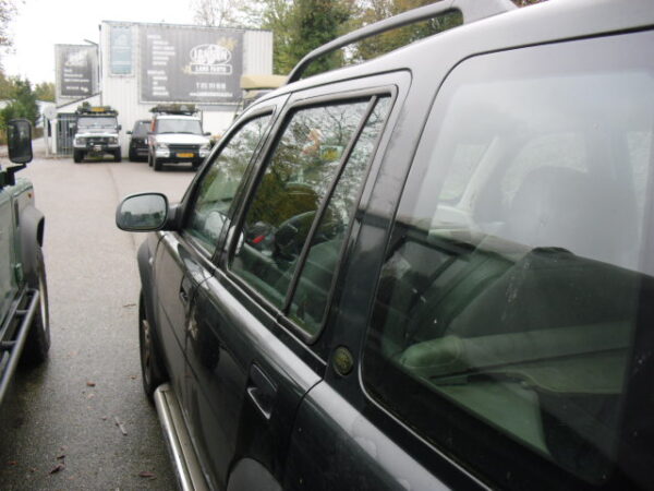 freelander 1 L314 stationwagon 1800 cc benzine , handgeschakeld kleur epson greenmet grijs leren stoelen bouwjaar 2002